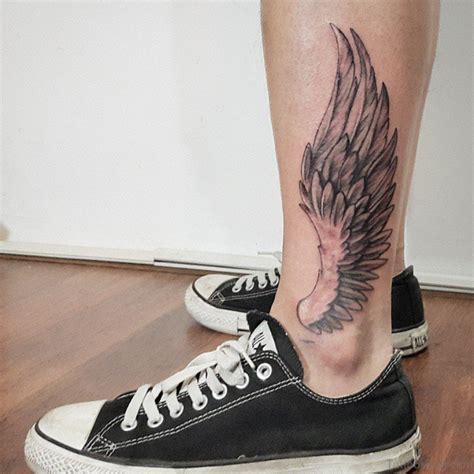 ankle wing tattoos